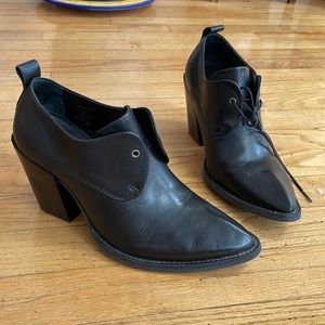 Fluevog booties . Black leather made in Portugal Worn twice but too high for me.